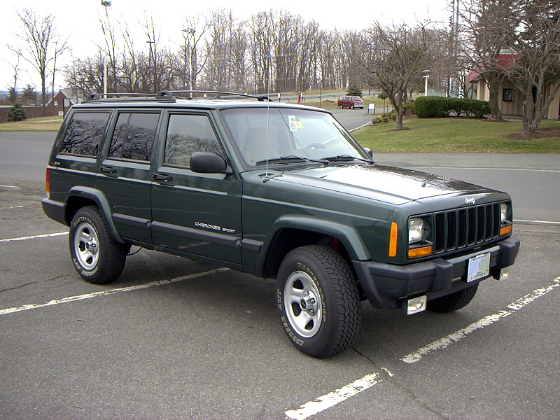 A Forrest Green 1999 Jeep Cherokee Sport was the second car I ever owned